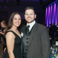 Guests posing together at Enrichment.